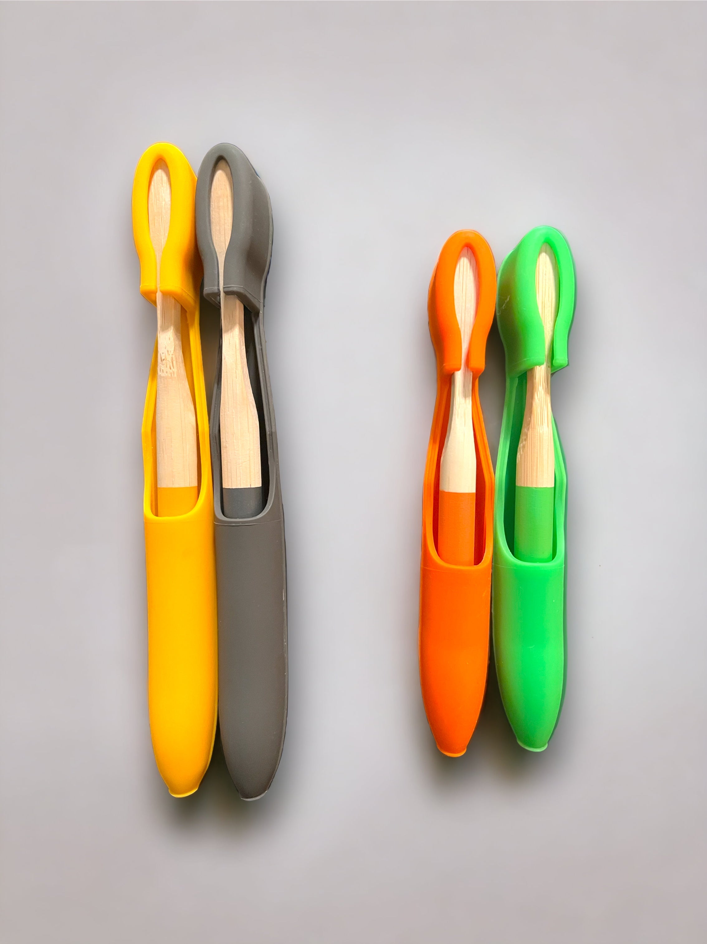 Two Adult Iconic Yellow & Grey |Two Kids + Green Nature Navigator & Orange Citrus Burst | Bamboo Toothbrush + Cover Sets